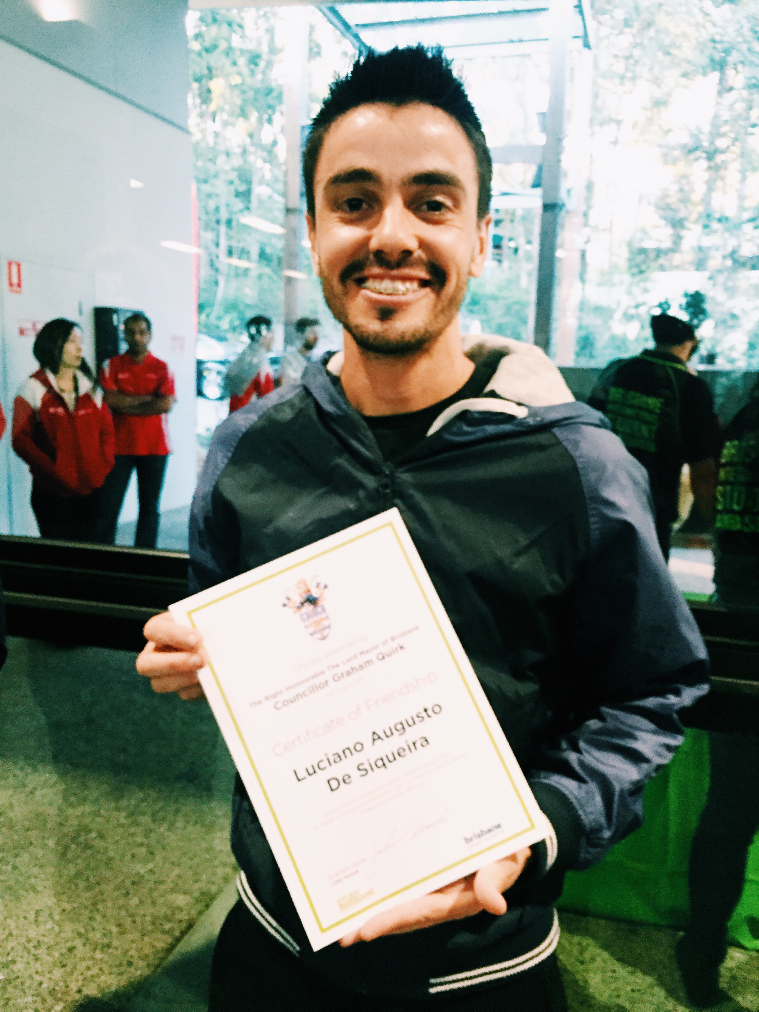 Brazilian I.T student, Luciano Augusto happy to receive a hand in friendship